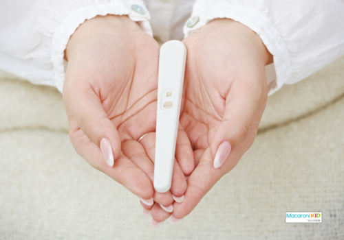 pregnancy test in woman's hands