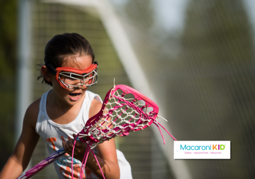 Lacrosse player in front of the net