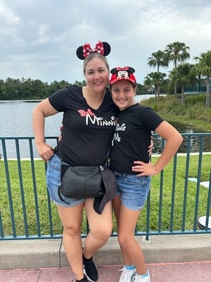 Tina, the publisher, with her daughter at Disney World