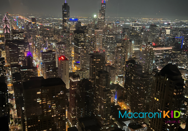 a view of the city of Chicago 1,000 feet up at night.