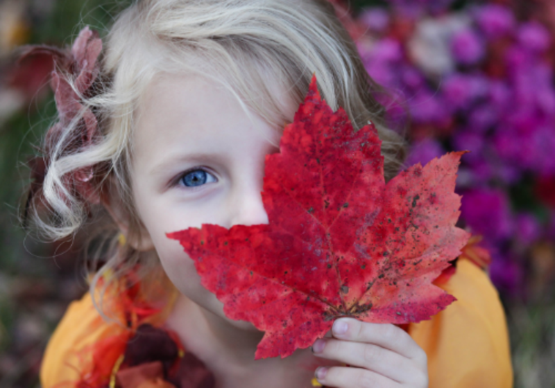 Girl in fall with leaf