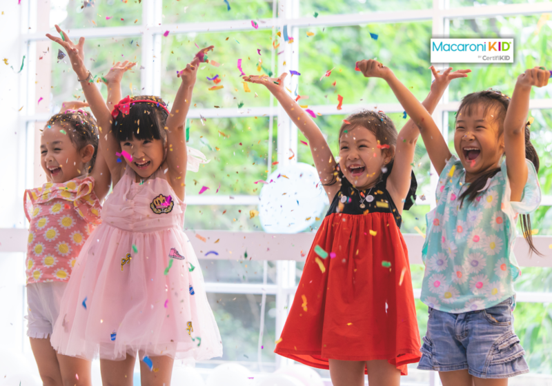 Kids are playing and throwing paper in kid party