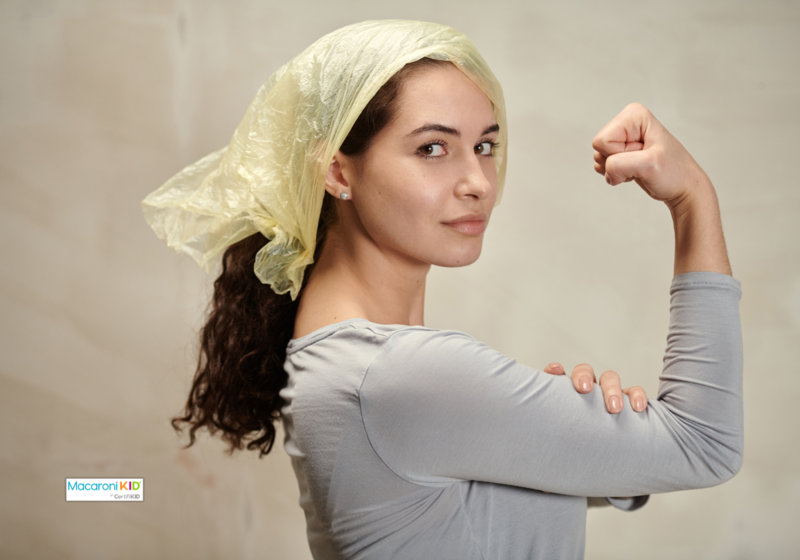a woman flexing her bicep