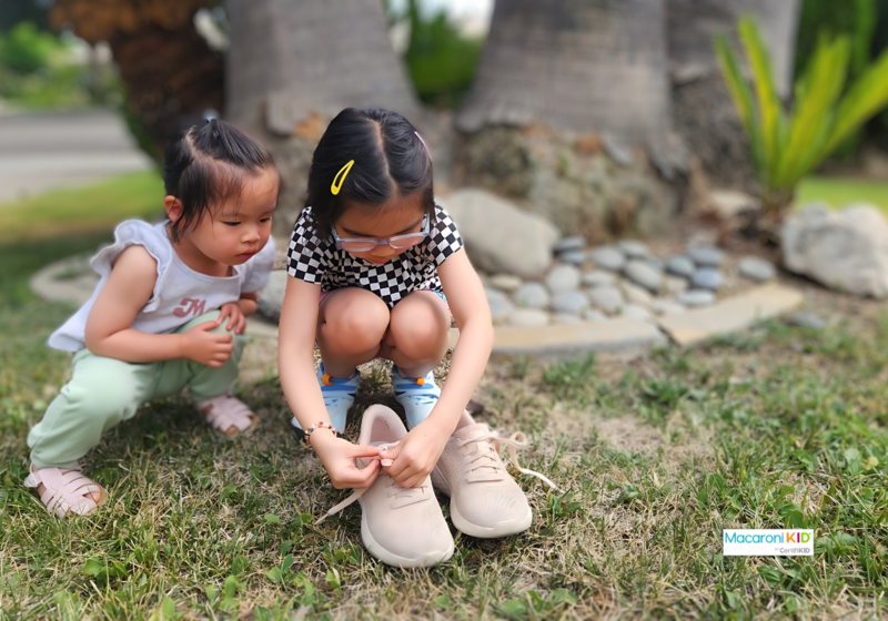 Essy Chen's daughter learns to tie shoes