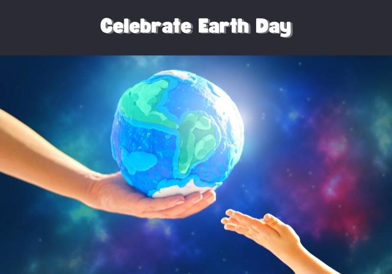 Adult handing model of Earth to child