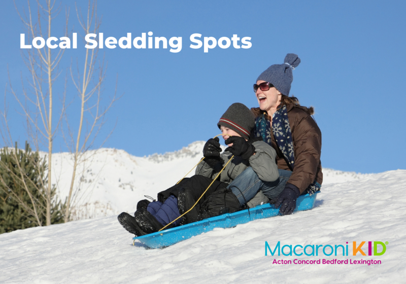 Woman and boy sledding