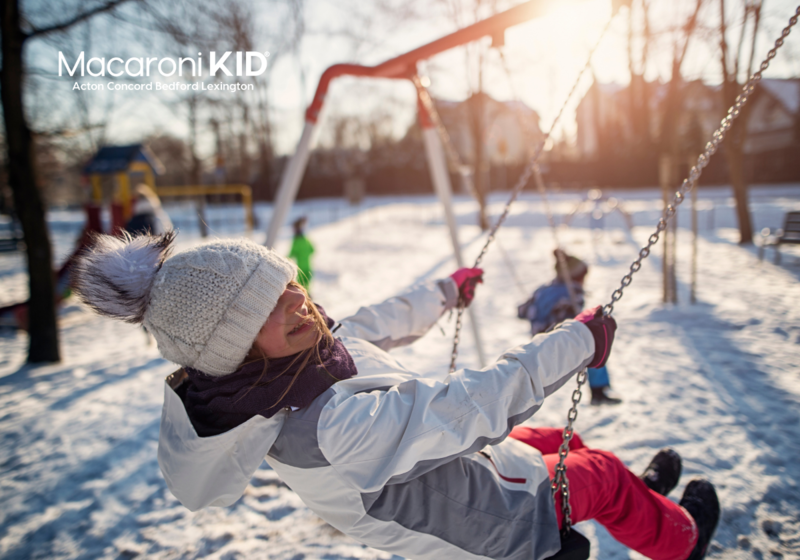 Girl on swing in winter