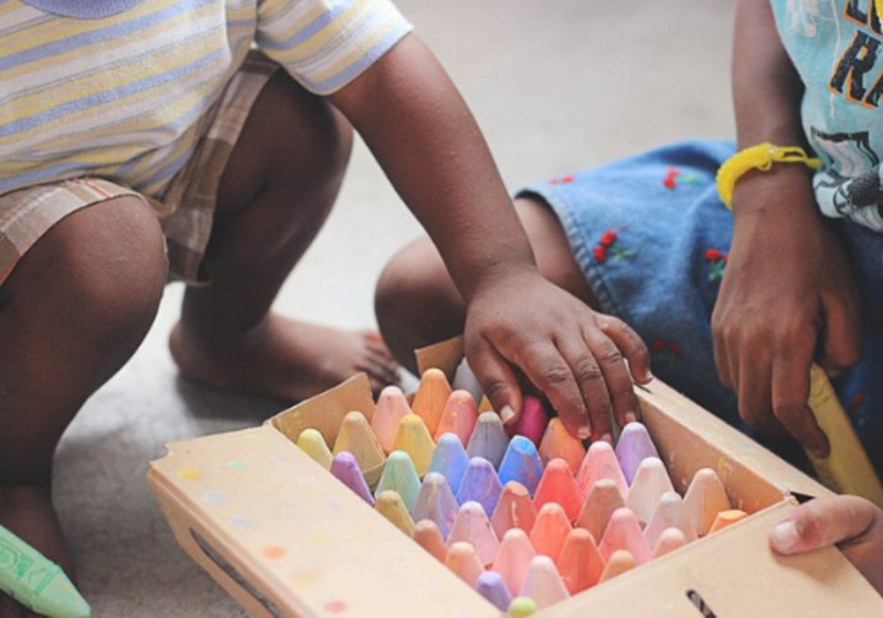 kids playing with chalk