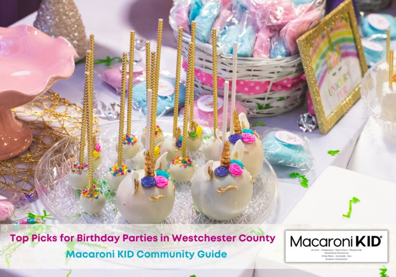 Image of unicorn themed birthday party spread with cake pops and favors