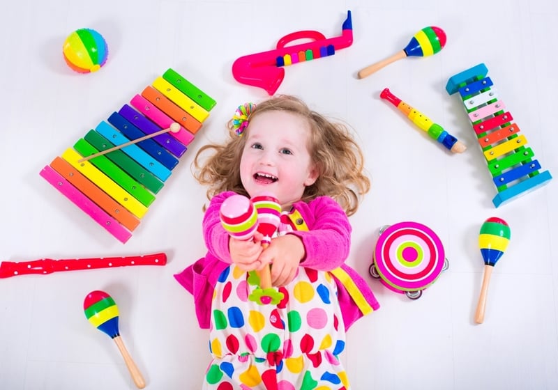 Little Tots of Tidewater parent and me class music and movement children preschool age babies toddlers playing instruments and dancing maracas tambourine shakers colorful Chesapeake VA Virginia Beach