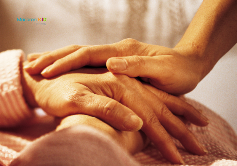 older hands with younger hands on top, for Papa