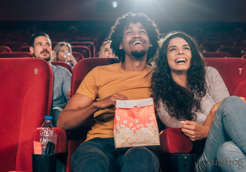 joyful couple at movie theater