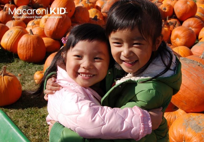 Girls in a pumpkin patch