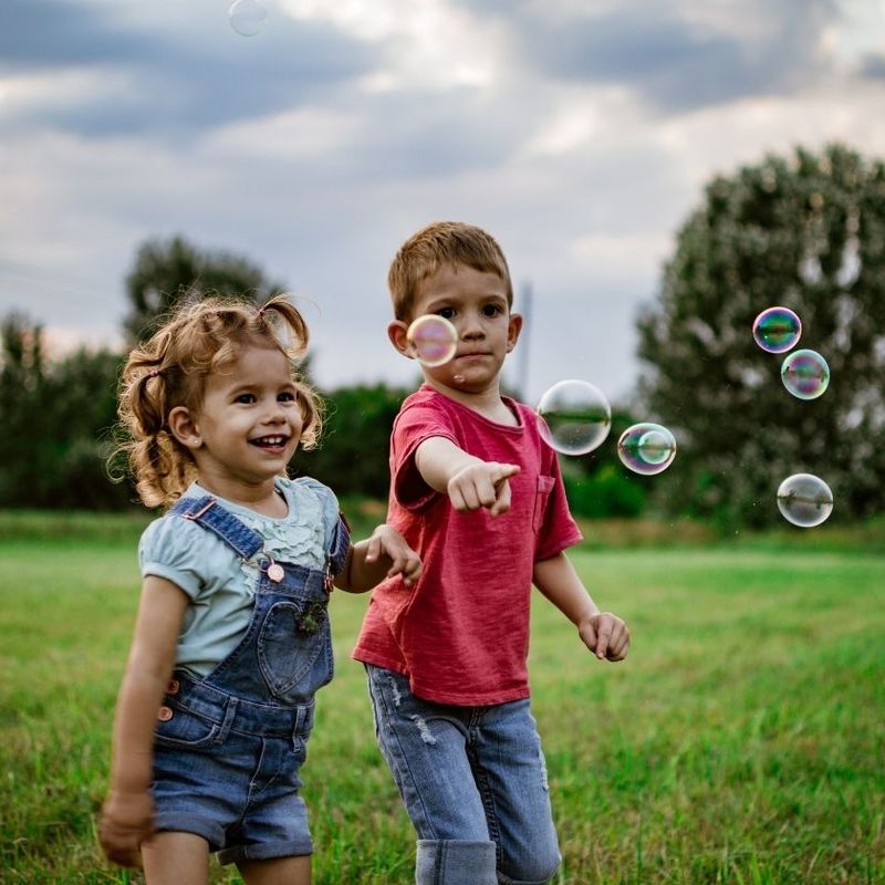Kids playing with Bubbles