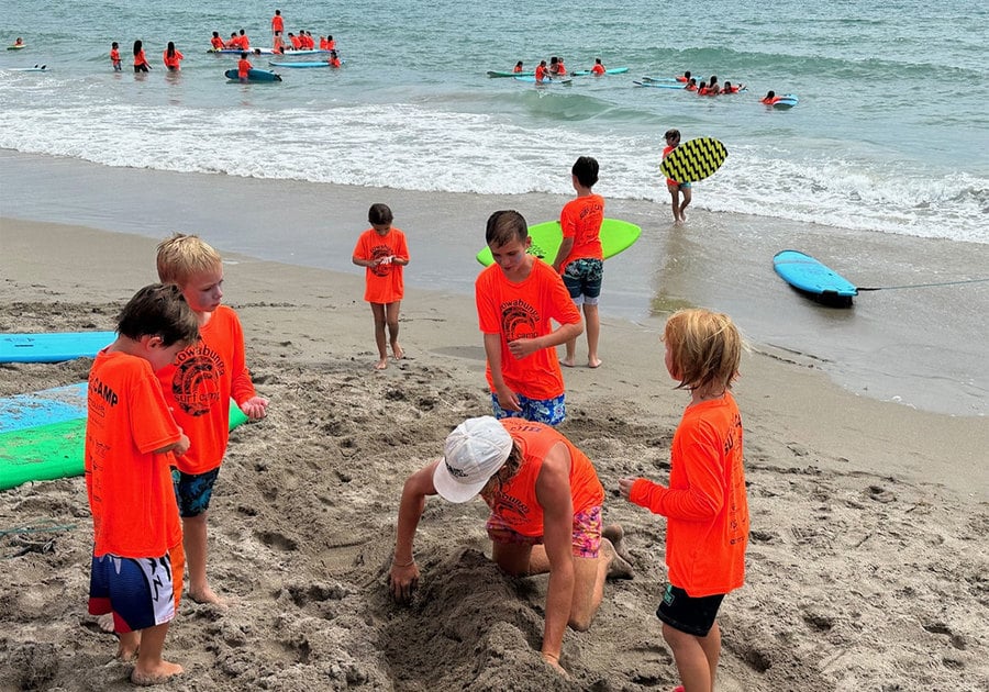 Cowabunga Campers playing in the sand at the beach
