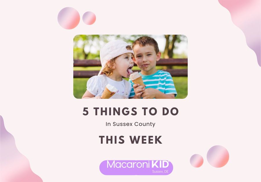 young boy in blue stripe shirt letting little girl with backwards baseball hat and white shirt have some of his ice cream