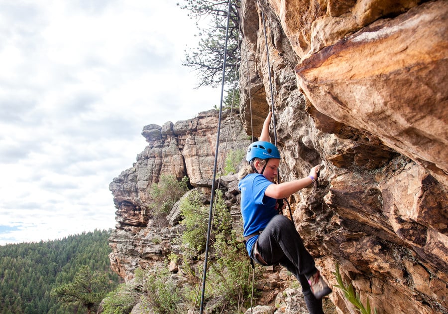 rock climbing at Girl Scouts of Colorado summer camp