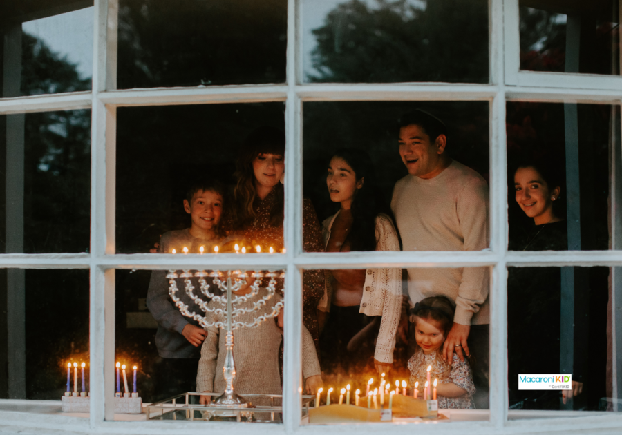 family celebrating hanukkah