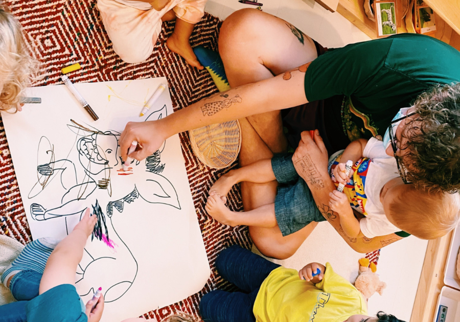 mom and toddler coloring a donkey picture
