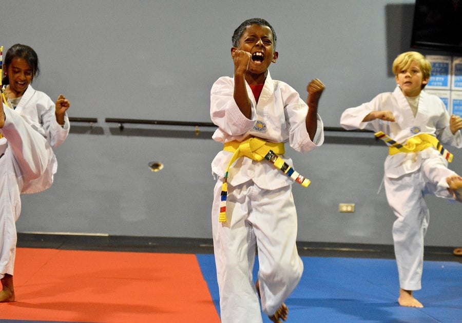 children practicing martial arts at Kicks R Us UMAC summer camp