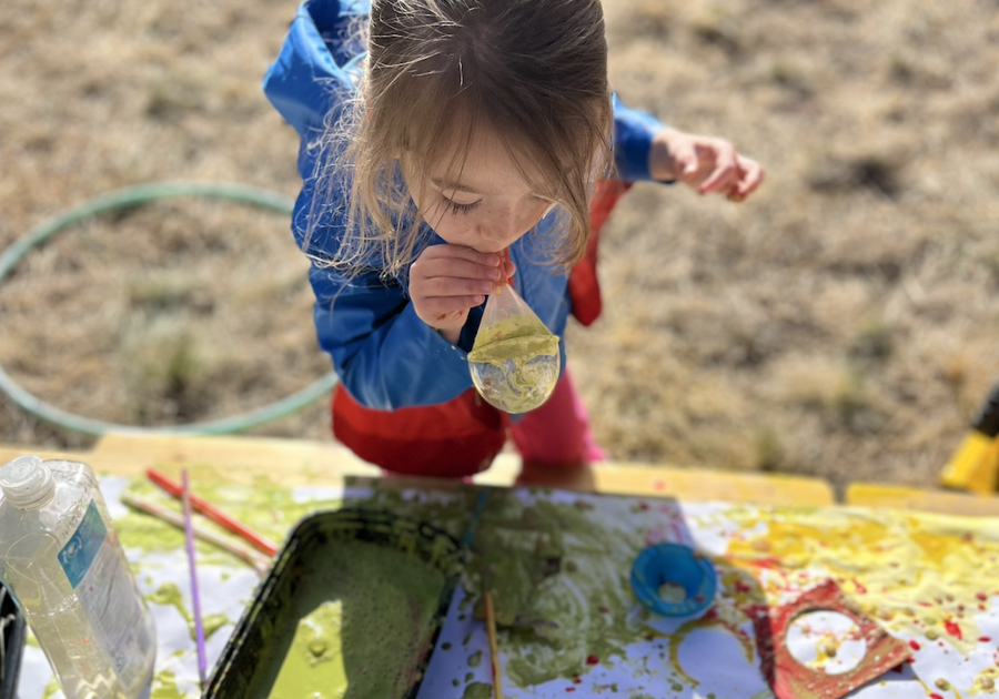 Kids Garden child blowing to make art