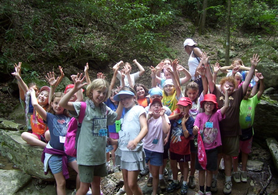 young girls having fun in the outdoors at girl scout summer camp in virginia