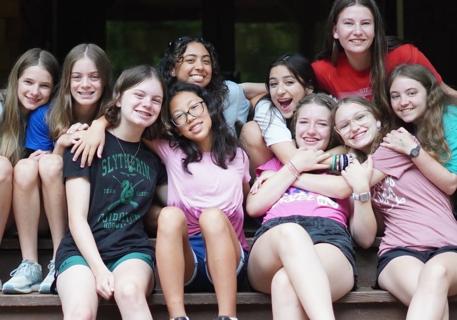 group of female campers posing for a photo