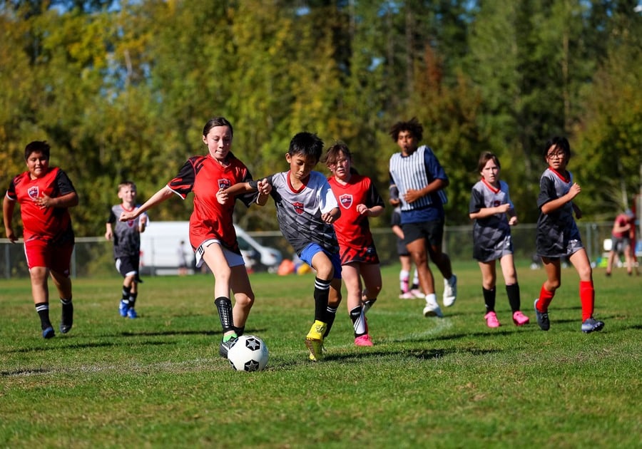 Children playing soccer