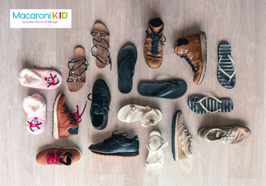 Assorted shoes on wooden floor