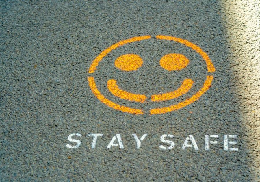 Stay Safe painted on ground