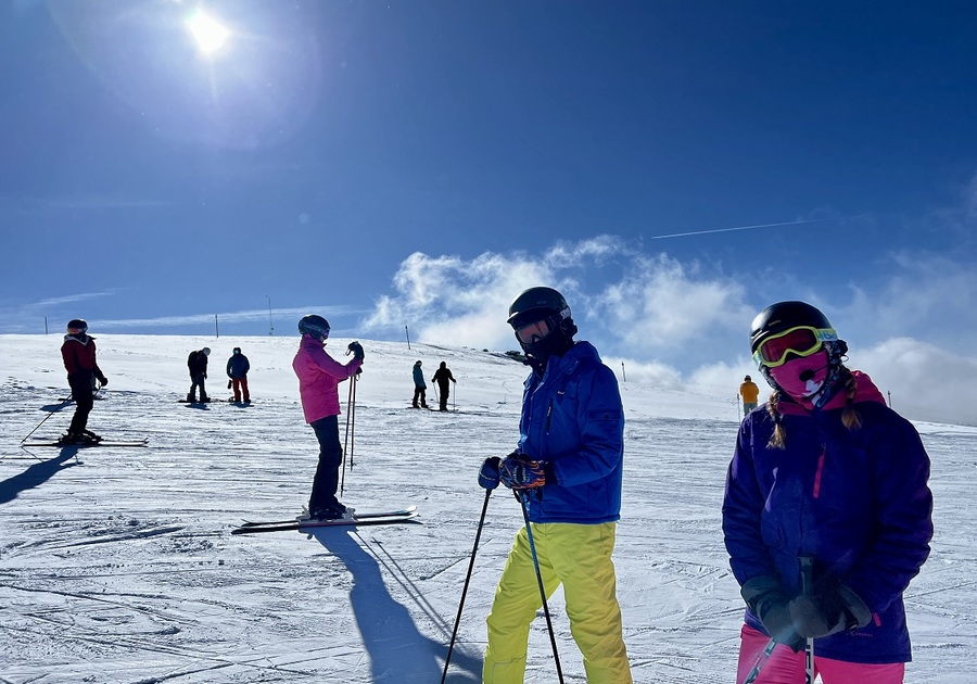 two skiiers at summit