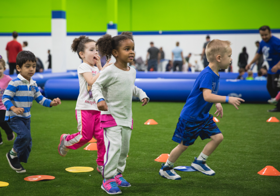 little kids playing soccer