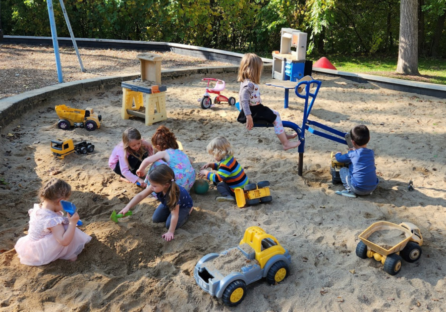 preschoolers playing in sand