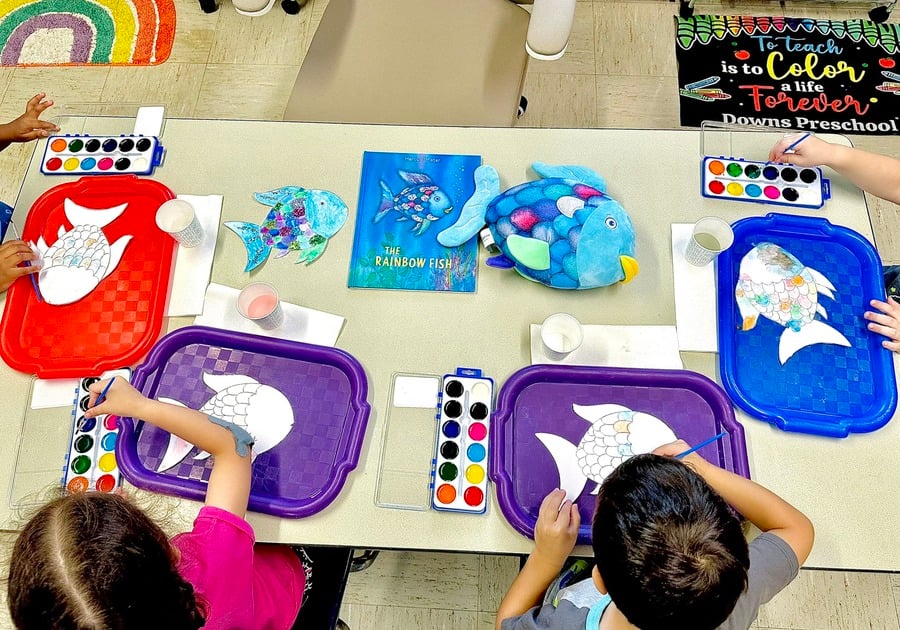 photo of students working on fish art project