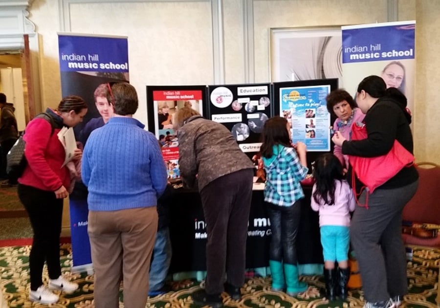 People attending an indoor fair