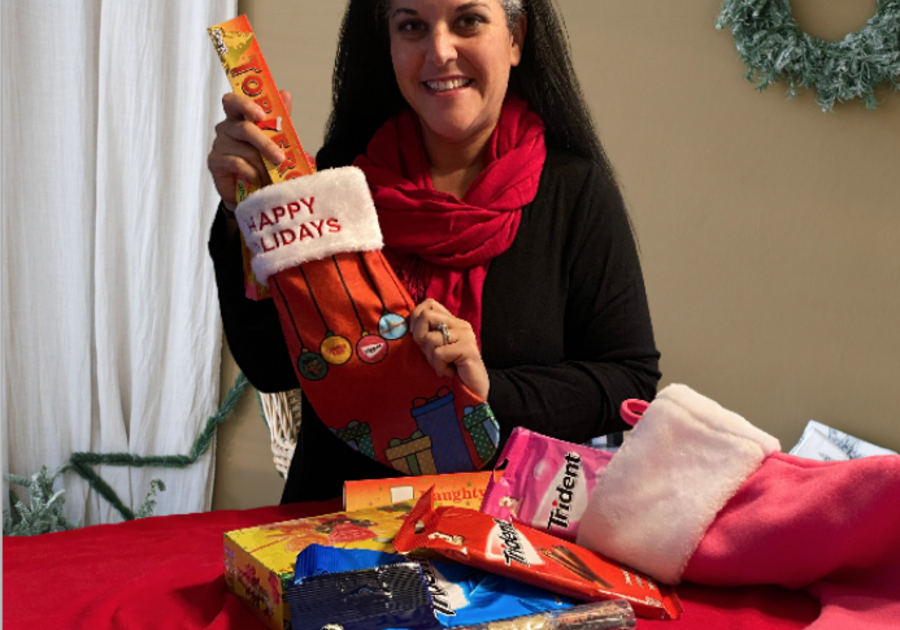 Mondelez International Group candies being stuffed into a stocking.