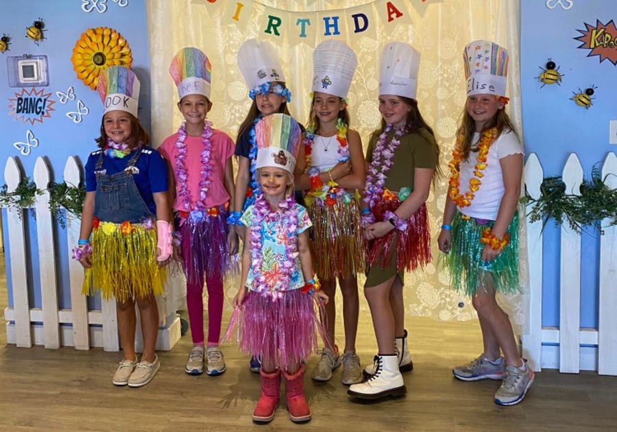 Children at a Flour Power Cooking Studios luau-themed Birthday Party