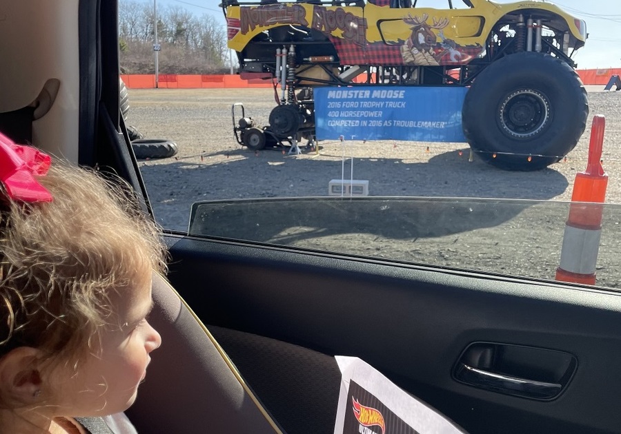 Child looking at Hot Wheels Monster Truck