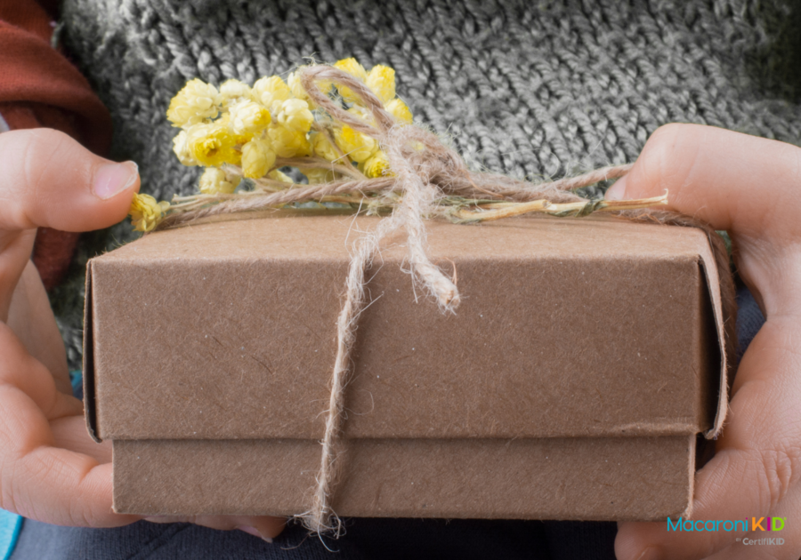 Child holding gift box