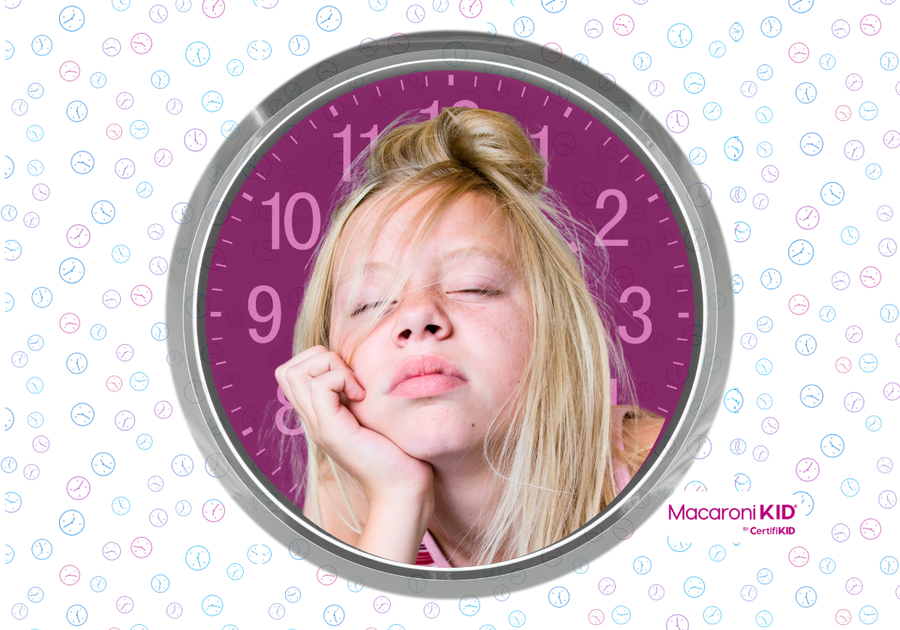 How can parents can survive Daylight Savings Time? Tired kid in front of a clock