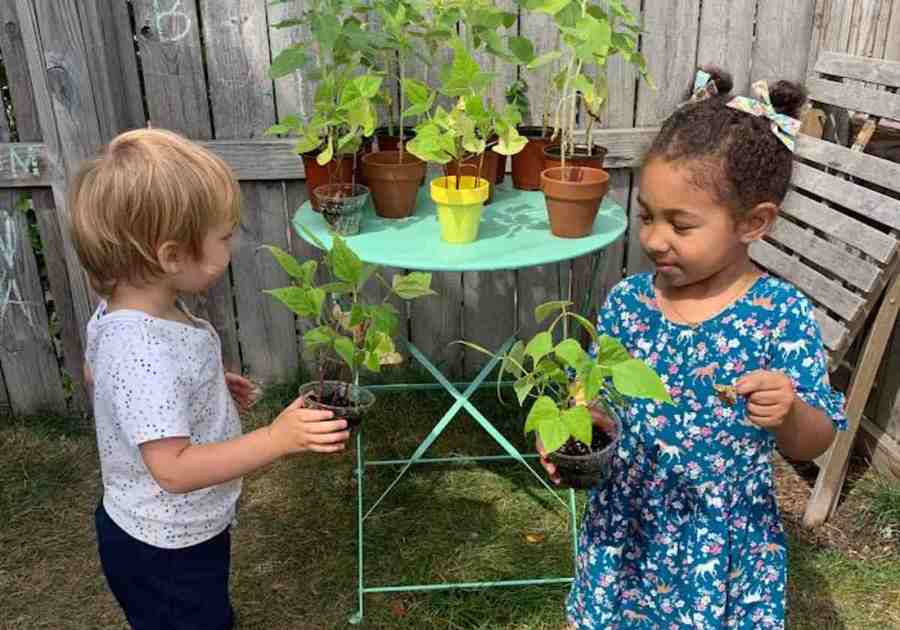 girl and boy gardening
