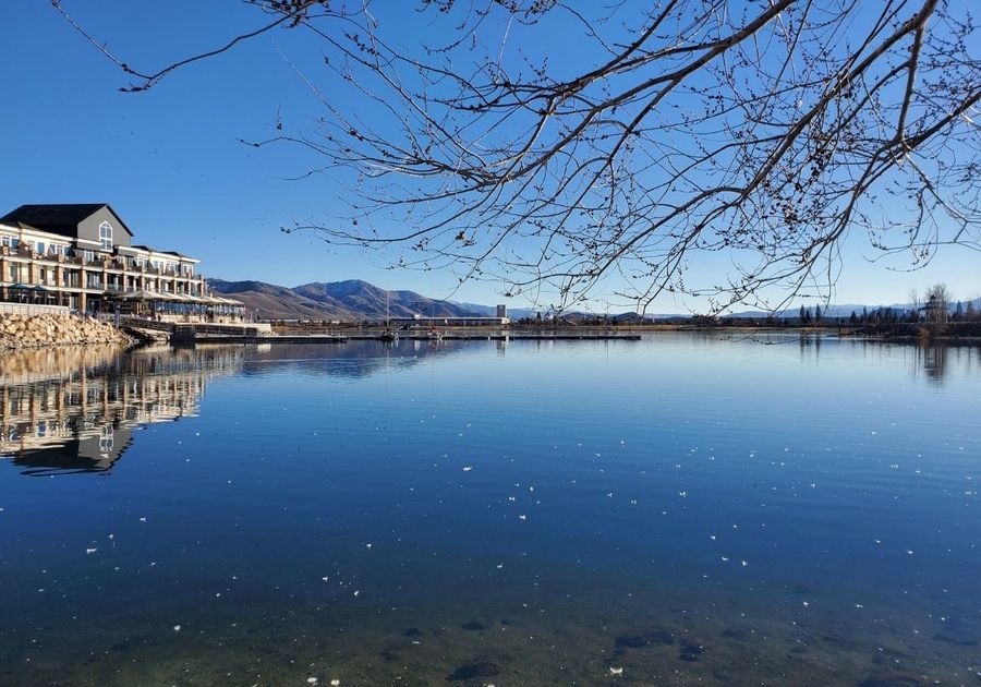 sparks marina view of water with distant restaurant and docks trees things to do outdoors in sparks reno area kids family ideas outside