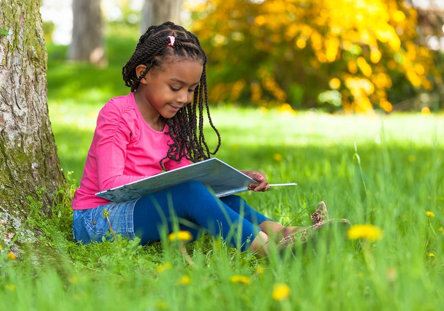 Girl Reading Outside