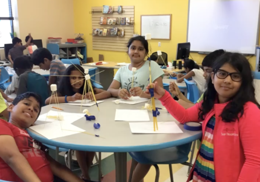 Girls building towers