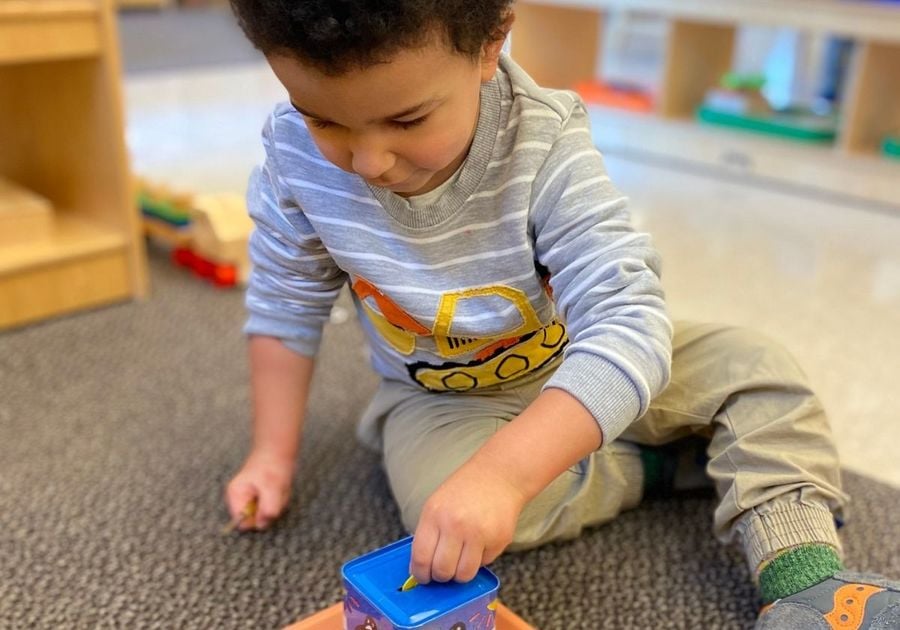 toddler playing with blocks