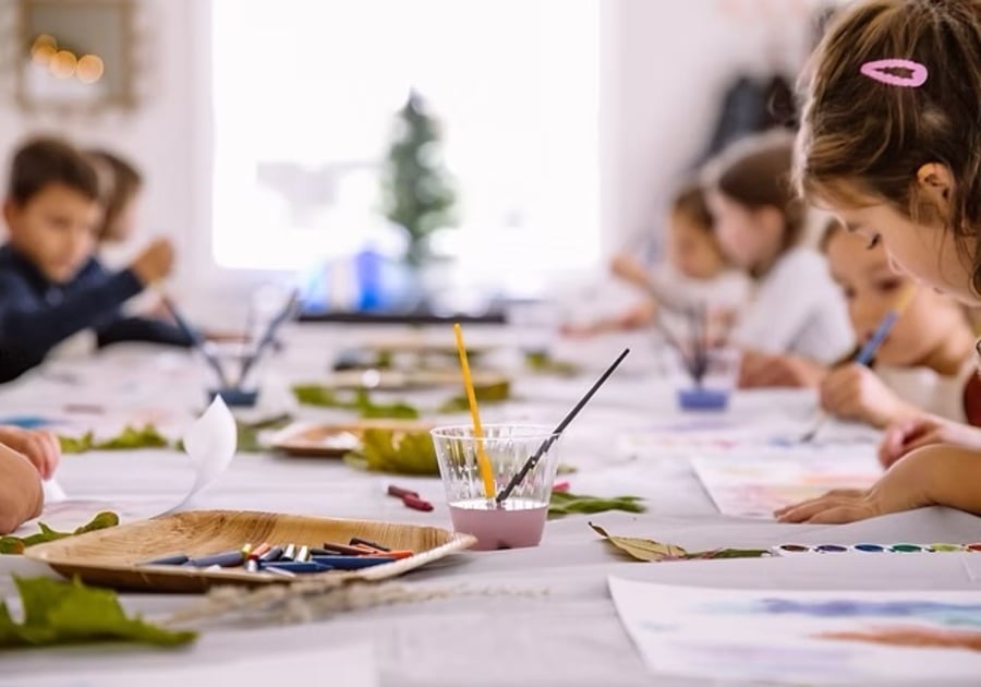 Camp Wonderkin children working at a craft table