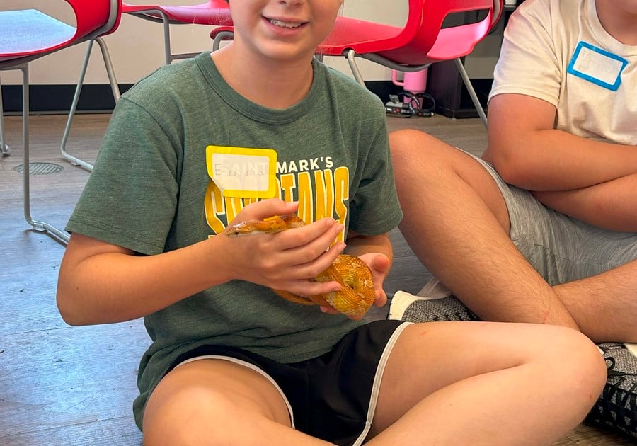 BVSPCA Critter Camp child holding a critter