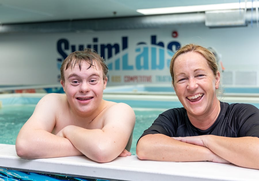 Special needs Child and instructor in SwimLabs swim lesson