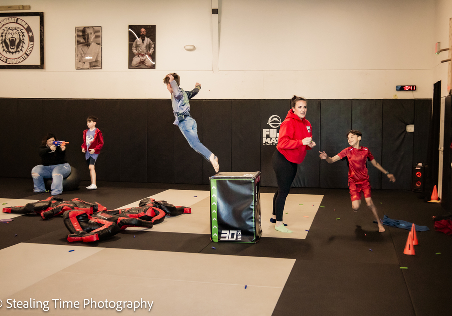 Kid catching air at Lionheart MMA & Fitness in Moncks Corner, SC