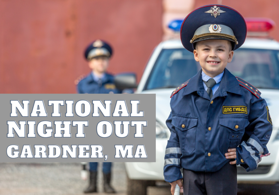 Small child dressed up as a police office standing in front of a police car. Text reads 